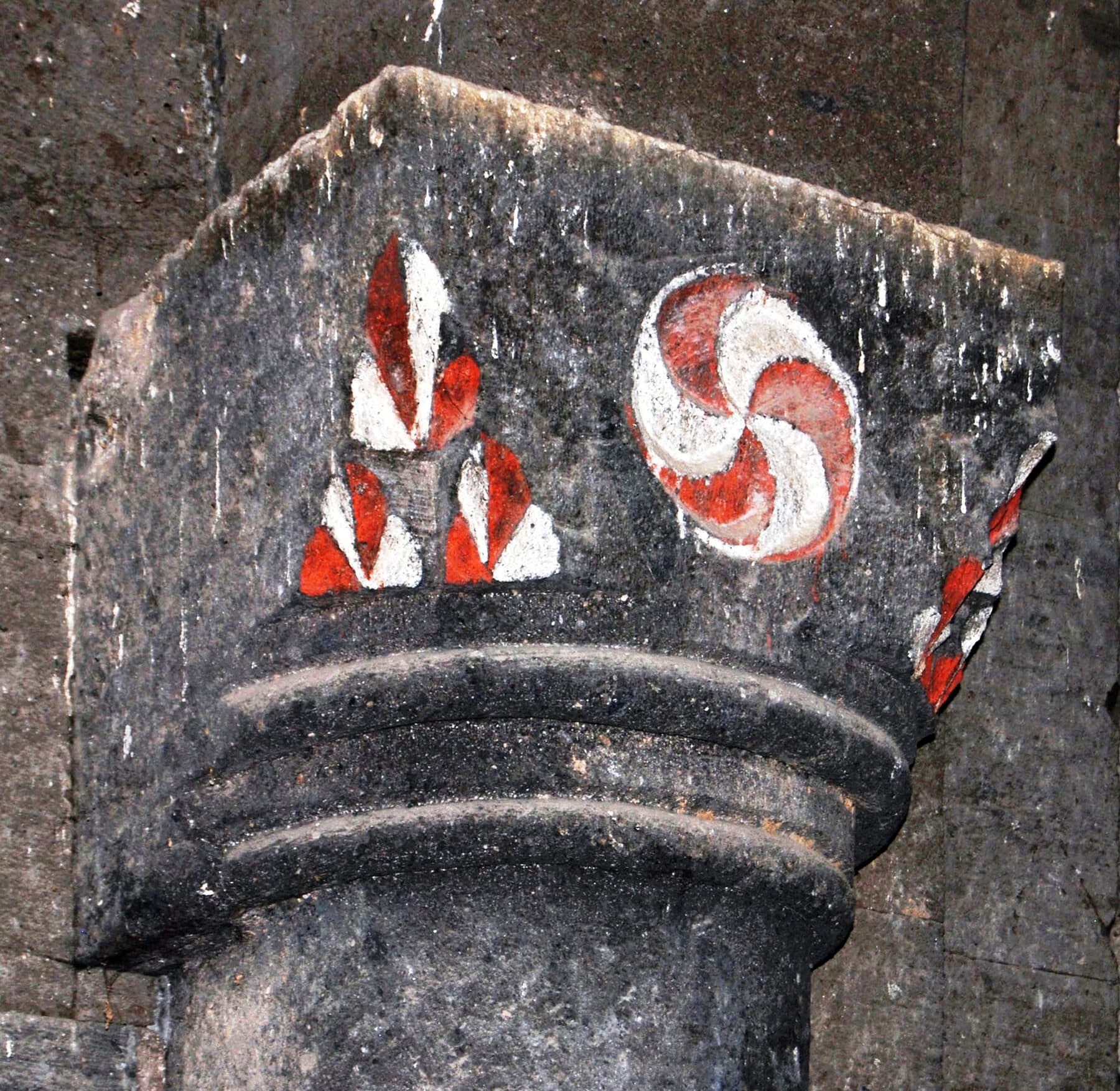 A 13th-century painted fresco of the Armenian eternity sign on a wall of Saghmosavank monastery.